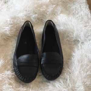 Black leather flats